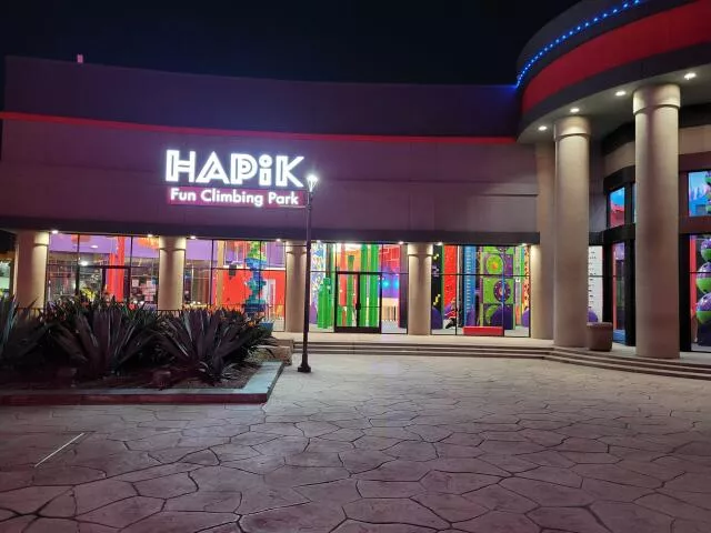 Hapik fun climbing Southgate sign